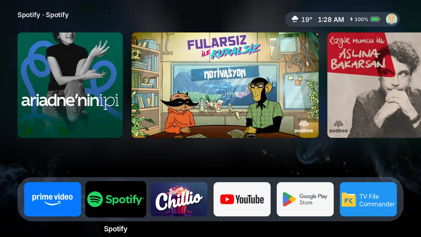 Dock'ta Spotify seçiliyken üstte Spotify kartları